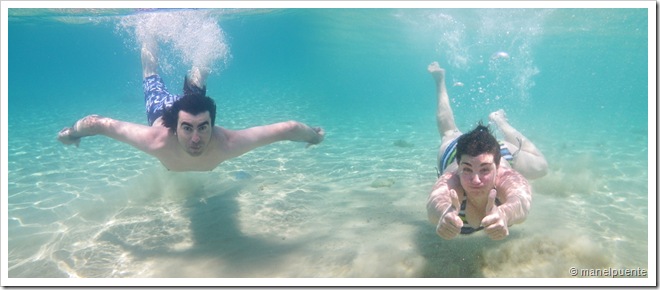 Nedant a la Cala de Benirr&agrave;s